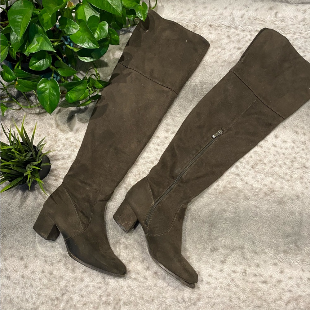 Green sued over the knee boots